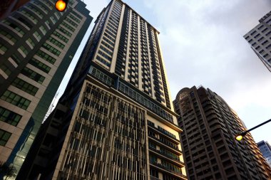 Commercial and residential buildings at the business district of the Ortigas Center in Pasig City clipart