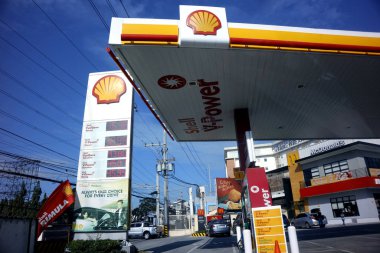 Cainta, Rizal, Philippines - February 16, 2020: Signage and building structure of a gas refilling station and a clear sunny day.