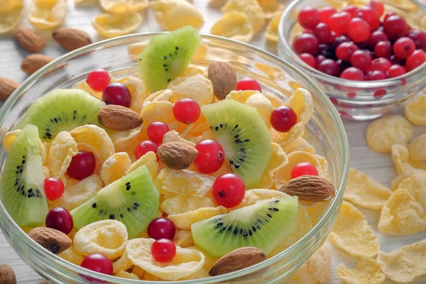 Two Bowls Cornflakes Kiwi Fruits Cranberries Scattered Almonds Cornflakes Table — Stock Photo, Image