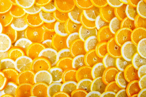 Abstracte Achtergrond Van Gesneden Sinaasappel Citroen Bovenaanzicht — Stockfoto