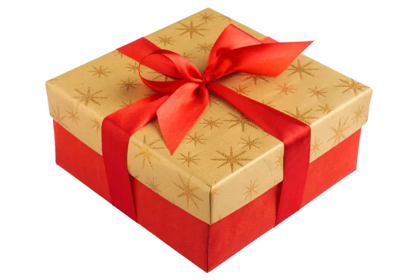 Red gift or present box with golden colored top and red ribbon bow isolated on white background Royalty Free Stock Photos