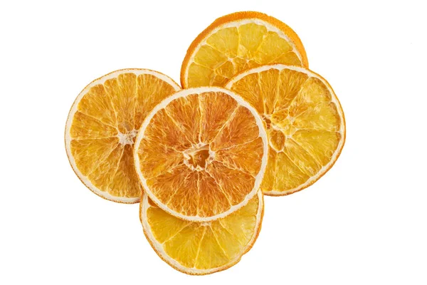 Beyaza izole edilmiş kurumuş portakal dilimleri yığını — Stok fotoğraf