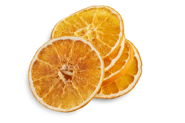 Beyaza izole edilmiş kurumuş portakal dilimleri yığını — Stok fotoğraf