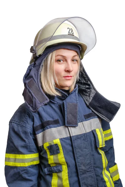 Portrait young brave girl firefighter in a fireproof uniform and helmet in her head looks at the camera. — 图库照片