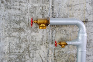 Two metal water pipes of industrial extinguisher system