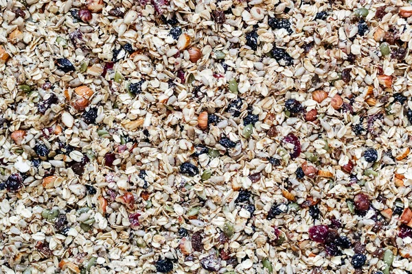 Top view close up granola, abstract cereal grain pattern, muesli texture as background Stock Picture