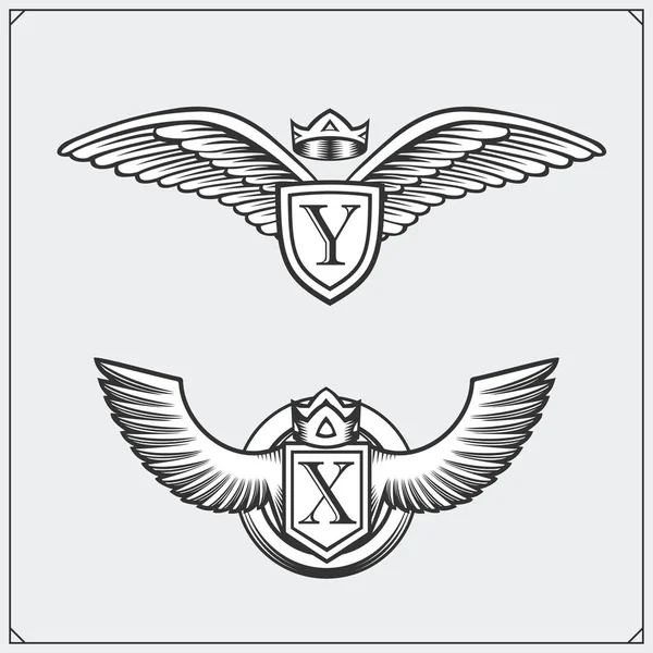 Állítsa be a heraldikai szárnyak. Design elemek. Vektoros illusztráció. — Stock Vector