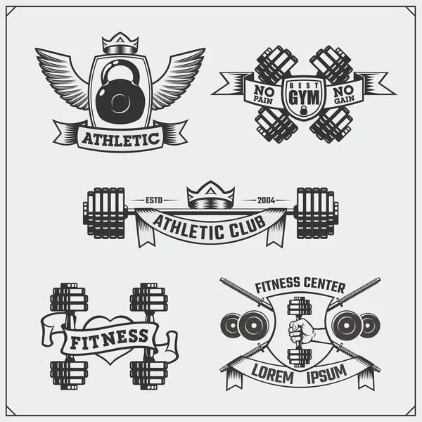 Colección de etiquetas de fitness en blanco y negro, emblemas, insignias, logotipos y elementos de diseño . — Vector de stock