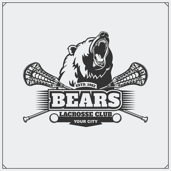 Эмблема клуба лакросса с головой медведя
.