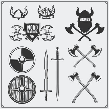 Viking set. Horned helmet, shield, sword and ax. Vintage style. clipart