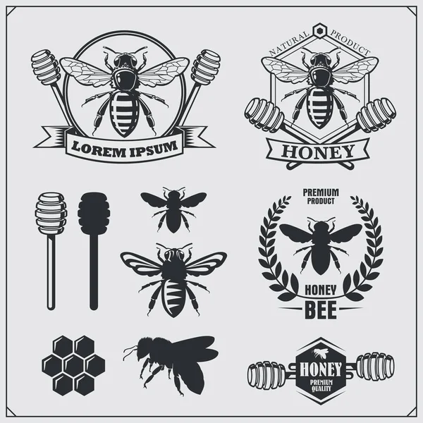 Ensemble d'étiquettes, d'insignes et d'éléments de design en miel. Peignes, abeilles, emblèmes de miel . — Image vectorielle