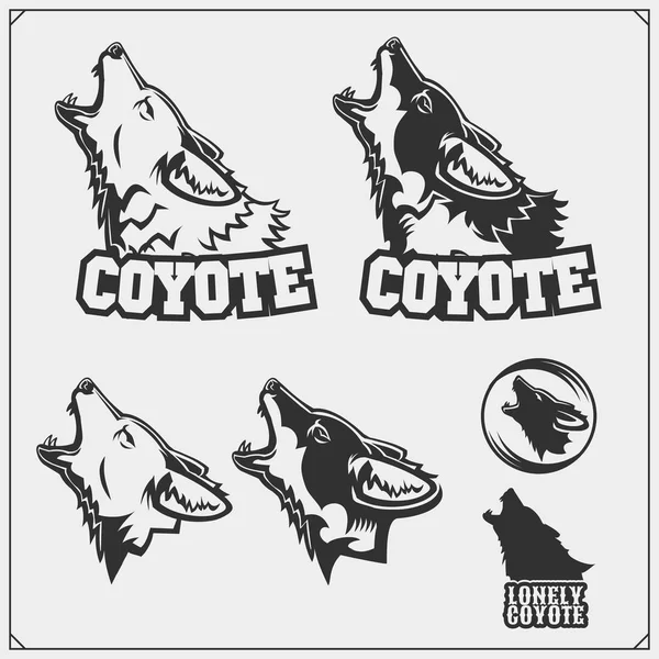 Los emblemas con el coyote para un equipo deportivo . — Vector de stock