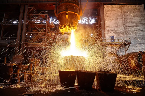 Ingot casting. Metallurgical production. — Stock Photo, Image