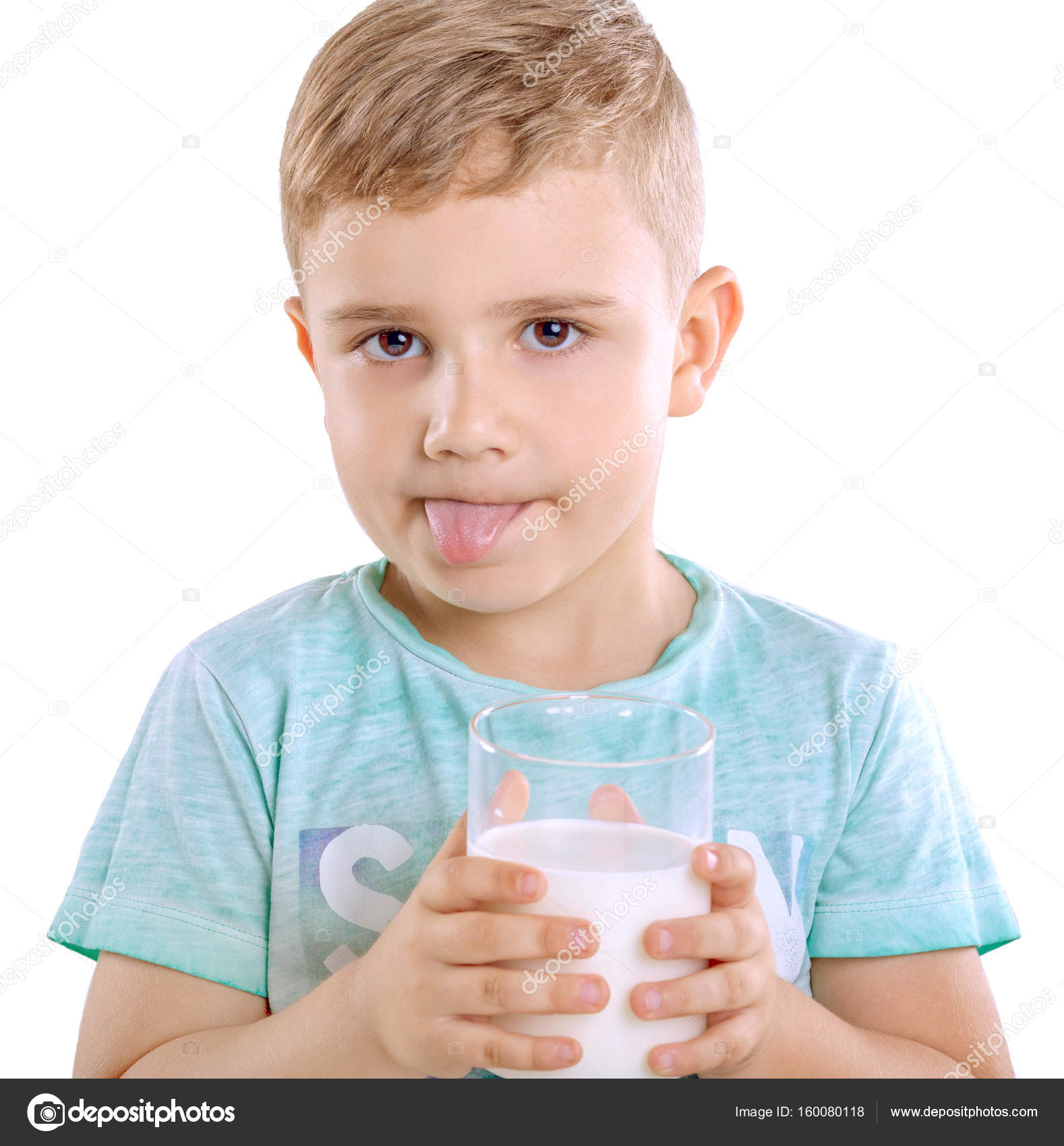 Beautiful Little Boy With Blonde Hair In Blue T Shirt Holds A