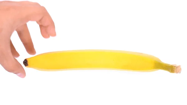 Una mano masculina quiere tomar una fruta de plátano madura y dulce aislada sobre un fondo blanco. Plátano amarillo brillante fresco . — Foto de Stock