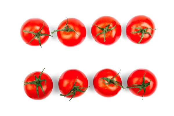Muitos tomates vermelhos suculentos, frescos, deliciosos e brilhantes com folhas, isolados em um fundo branco. Um grupo de tomates inteiros, nutritivos e maduros um topo da visão . — Fotografia de Stock
