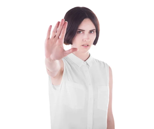 Nahaufnahme einer wütenden Frau mit Stop-Geste, isoliert auf weißem Hintergrund. eine enttäuschte und entschlossene junge brünette Frau. — Stockfoto
