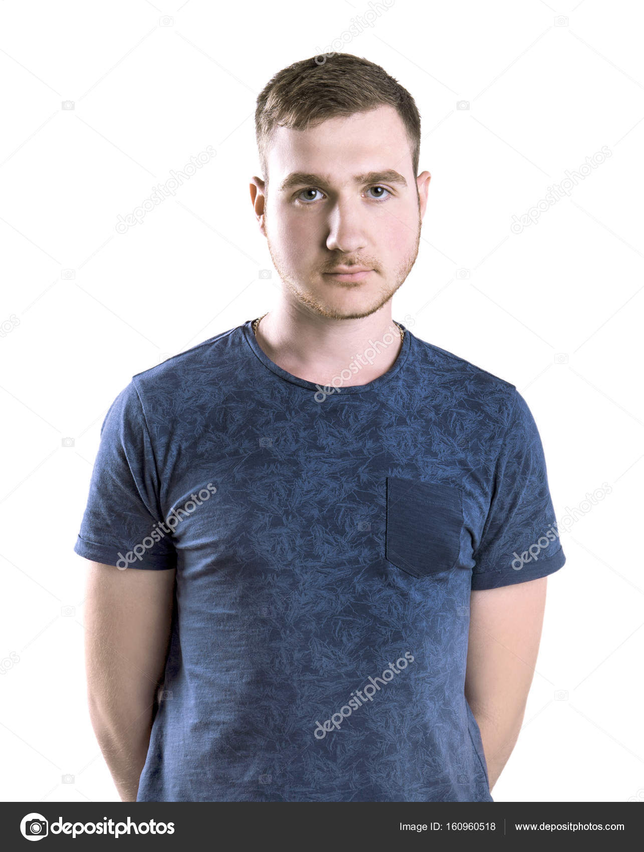 A Student Isolated On A White Background A Young Man Posing