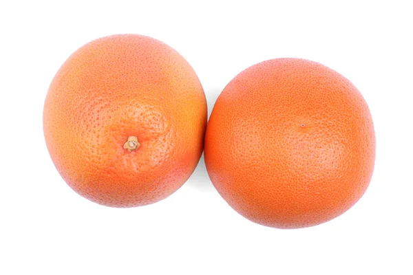 A pair of grapefruits isolated on a white background. Whole juicy grapefruits. Refreshing citruses for fresh summer drinks. — Stock Photo, Image