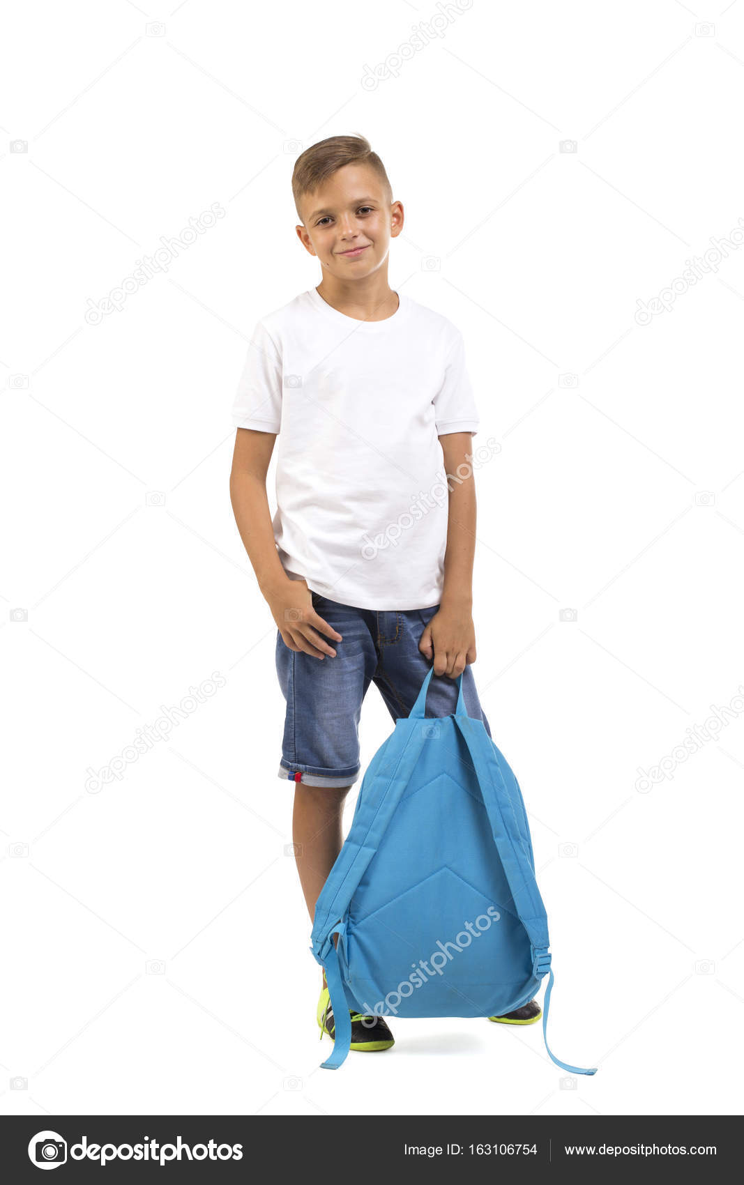 kid holding backpack