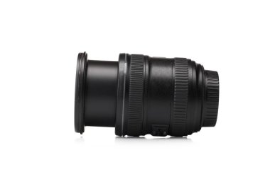 Beyaz bir arka plan üzerinde izole yalancı bir kamera objektifi close-up. Büyük optik objektif modern kameralar için. Kopya alanı.