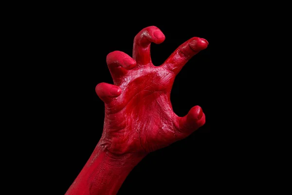 Las manos humanas pintadas de rojo posan sobre un fondo negro . — Foto de Stock
