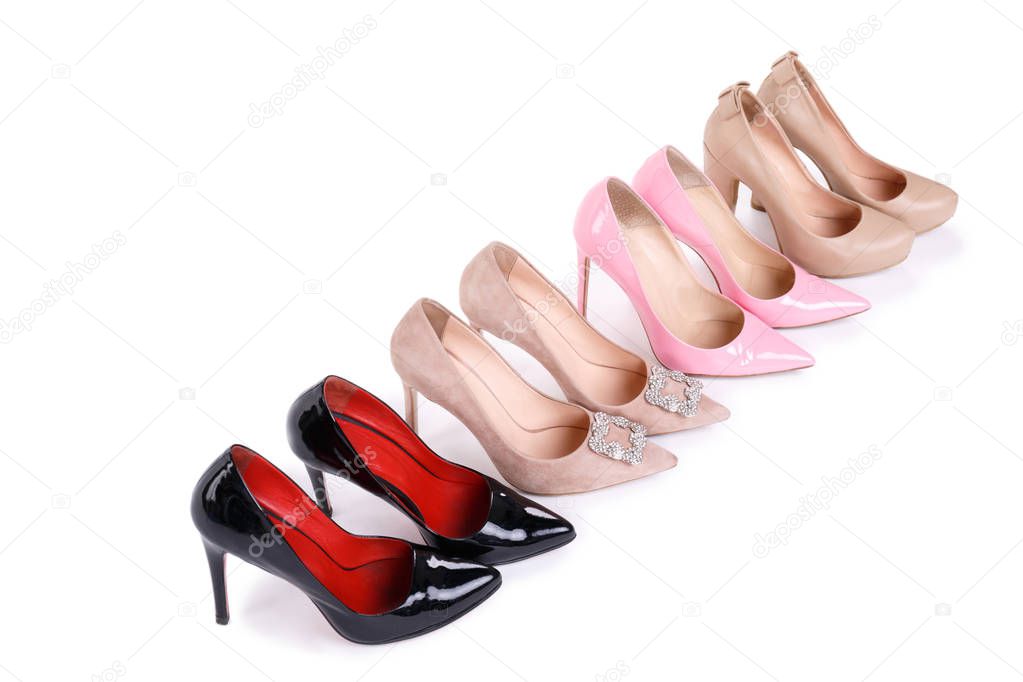 Female high-heeled shoes isolated on white background.