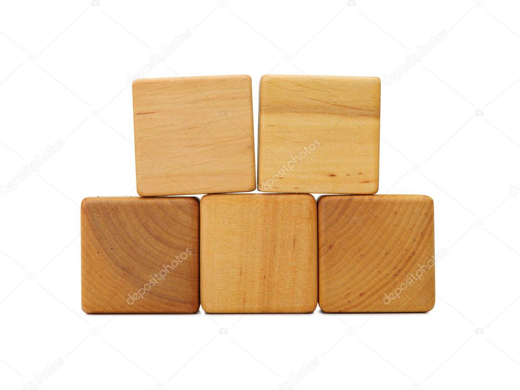 Several wooden cubes blocks with empty copy space for message word, isolated in white. Wooden cubes on white background with copy space. Still-life picture taken in studio with soft-box.