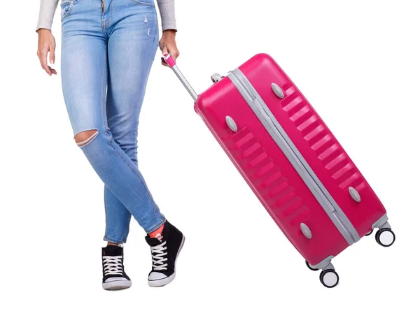 Κορίτσι ταξιδιώτης με μια ροζ βαλίτσα. Απομονωμένα σε λευκό φόντο. — Φωτογραφία Αρχείου