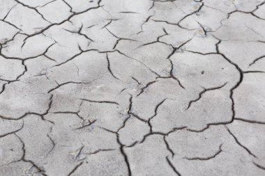 Dekoratif ışık gri çimento desen arka plan. Eski, kırık çimento bir yol yüzeyi veya bir duvar için. Dokulu beton malzeme. Soyut dağınık dokulu kavram. Kopya alanı.