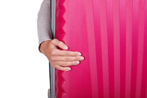 Beyaz bir arka plan üzerinde izole kadının elinde büyük pembe çanta.