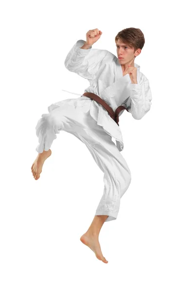 Młody facet karatek z brązowy pas na na białym tle — Zdjęcie stockowe