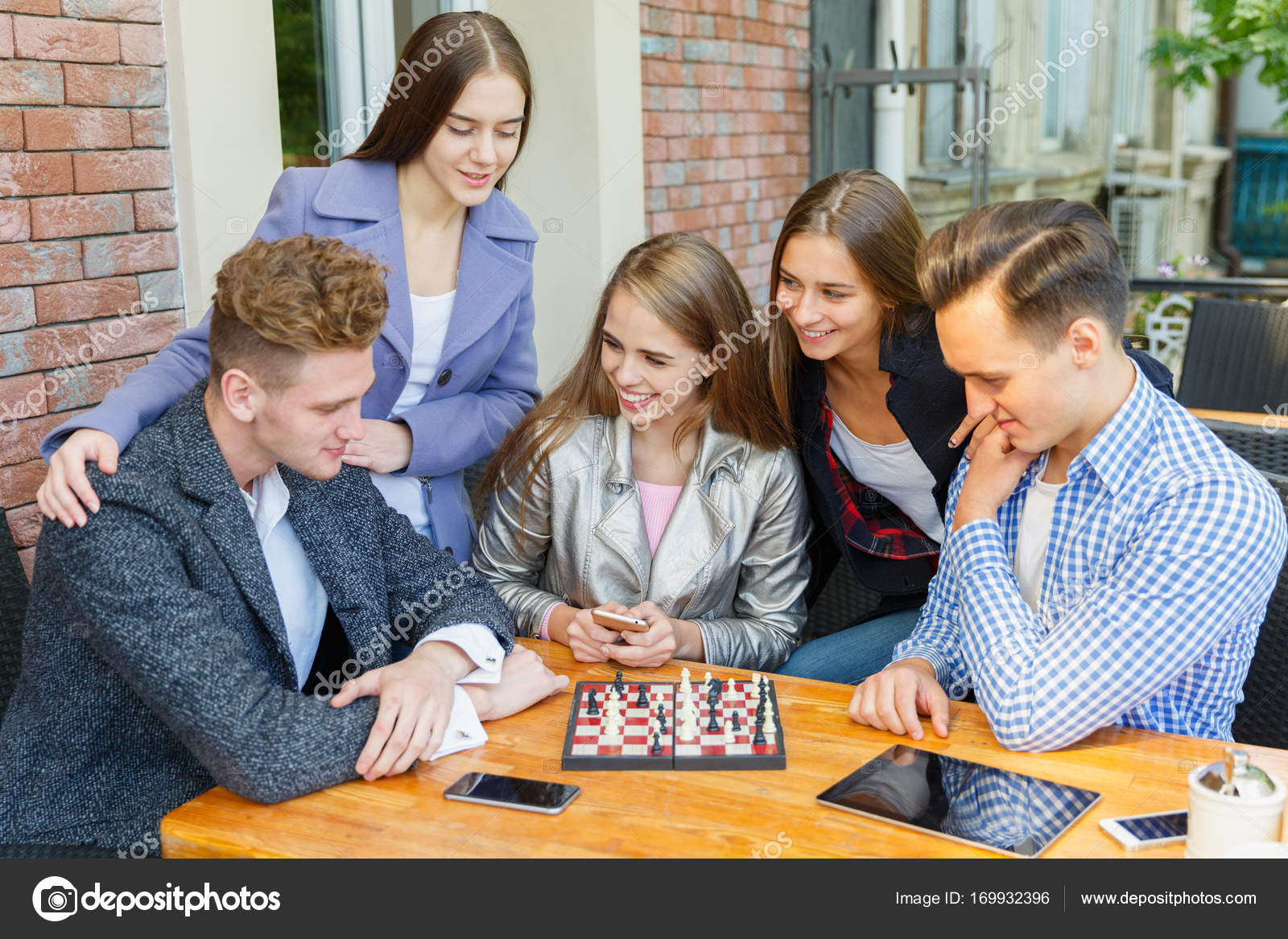 friends playing chess, Stock image