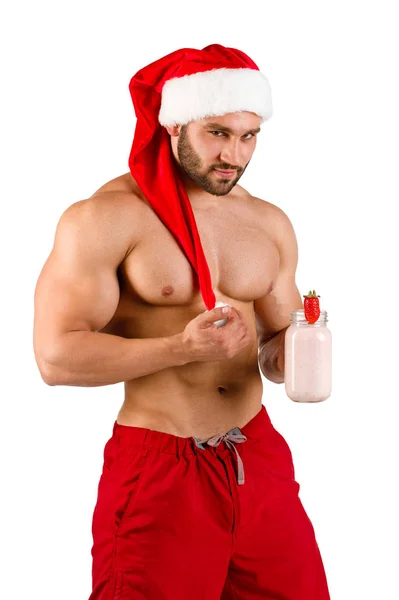 Сексуальный рождественский мужчина позирует перед камерой на белом фоне . — стоковое фото