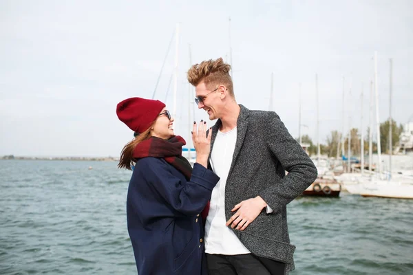 Cheerful young couple having fun and laughing together outdoors. — Stock Photo, Image