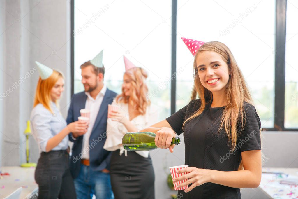 A group of office workers are excited about the holiday they celebrate