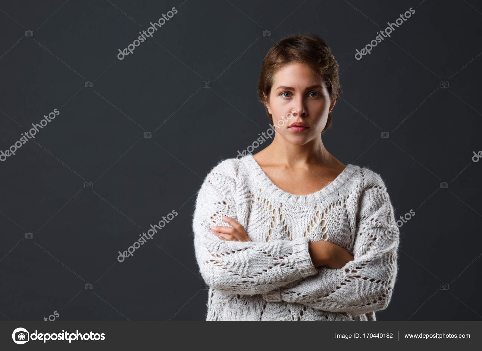 Dark Haired Girl With Short Hair On A Black Background Stock