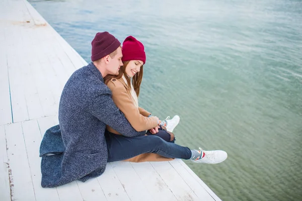 Cheerful young couple having fun and laughing together outdoors. — Stock Photo, Image