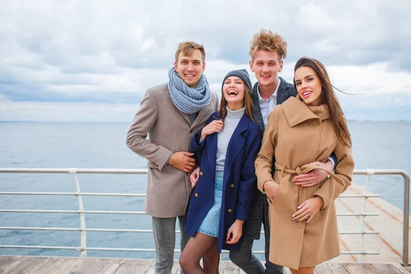 Funny young company having fun and laughing outdoors. — Stock Photo, Image