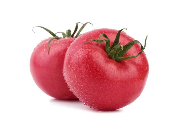Φωτεινό κόκκινο φρέσκες ντομάτες με φύλλα — Φωτογραφία Αρχείου
