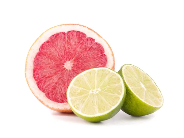 Juicy grapefruits and lime slices — Stock Photo, Image