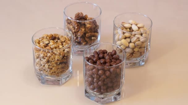 Nuts mix. Pistachios. Walnut. Assorted nuts. Muesli. Chocolate Corn Balls — Stock Video