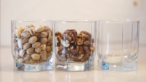 Nuts mix. Pistachios. Walnut. Sunflower seeds. Assorted nuts — Stock Video