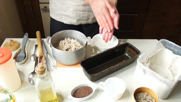 Baker kneads dough — Stock Video