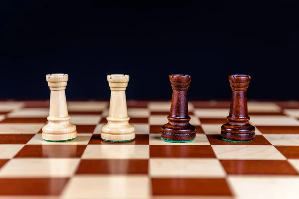 Chess Queen And Rooks On Board Stock Photo - Download Image Now - Chess,  Tower, Chess Board - iStock