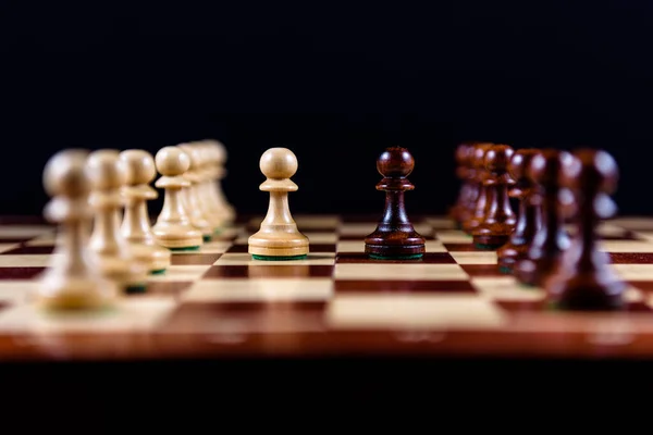 Fight Pawns Black White Wooden Pawns Chessboard Black Background — Stock Photo, Image