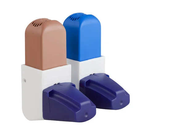 Blue and Brown Asthma Inhalers with caps — Stock Photo, Image