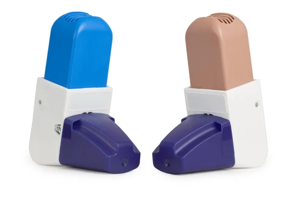 Modré a hnědé astma inhalátory — Stock fotografie