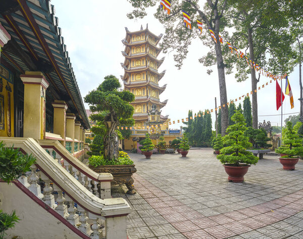 Architecture temple tower with large yard and house many beautiful patterned