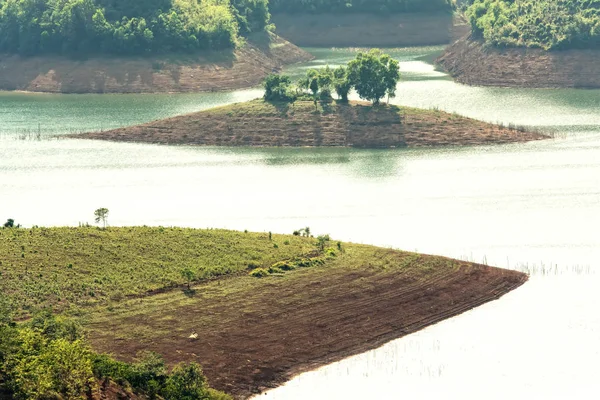 Sunny afternoon on the hillside hydrogen lake Ta Dung. There are large reservoirs providing water for large areas in the highlands of Vietnam